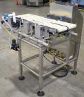 Used Loma LCW-3000 Belt Checkweigher with Reject. Up to 6.6 lbs capacity.